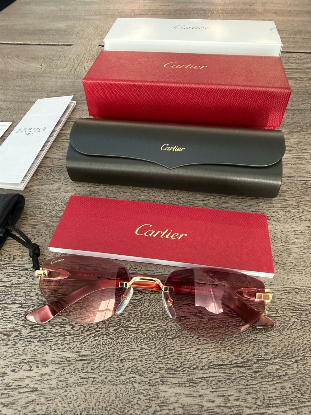 Cartier Rimless Sunglasses with Pink Gradient Lenses and Gold Bridge CT0580S-002